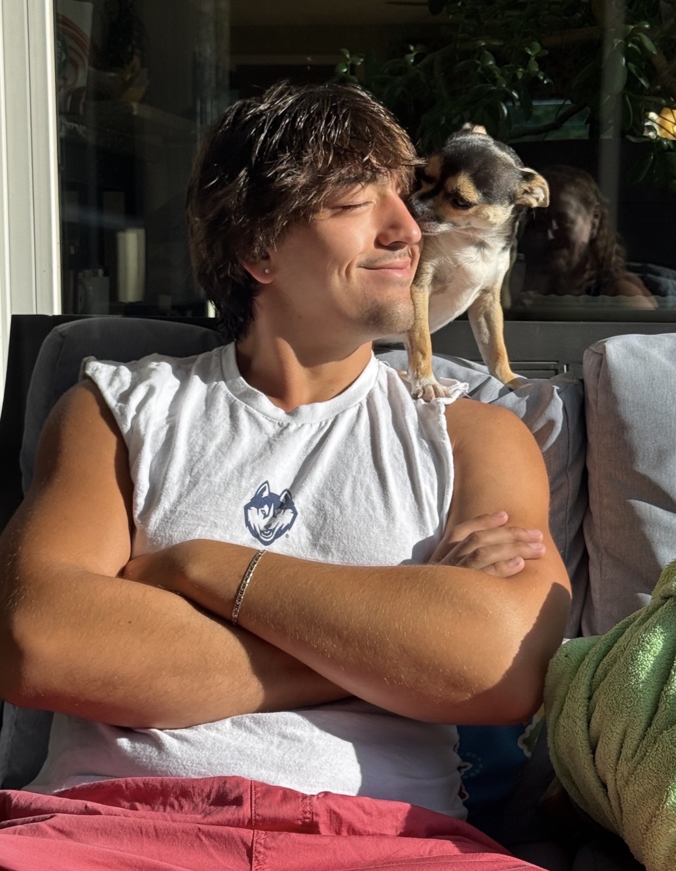 Portrait of Cooper smiling at the camera