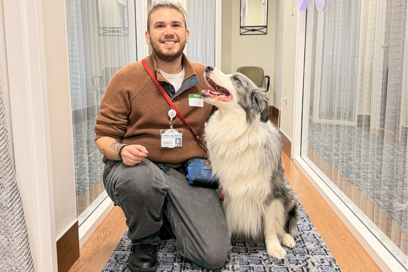 4 Howie and his therapy dog pausing for a picture